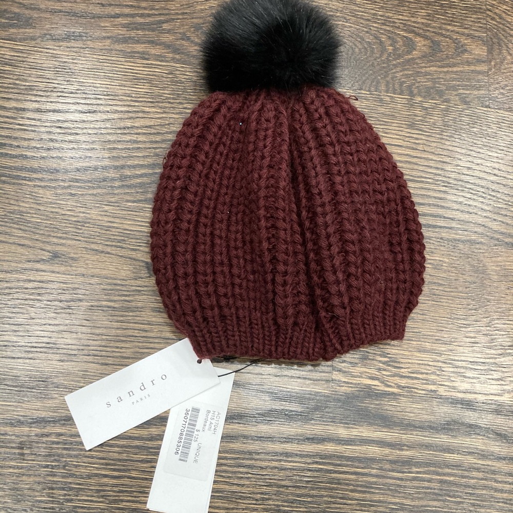 Knit hat with pom pom